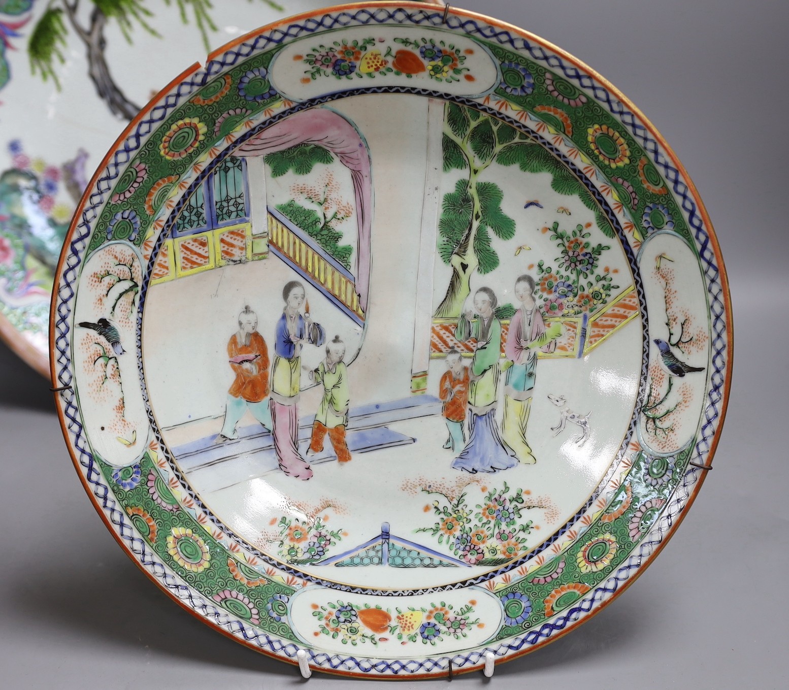 Two Chinese Republic period famille rose dishes, damaged, largest 33cm